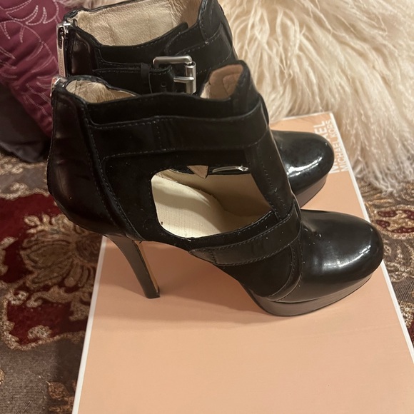 Michael Kors patent leather platform heels. Buckles and ankle height. 
Size 7M - Picture 9 of 16